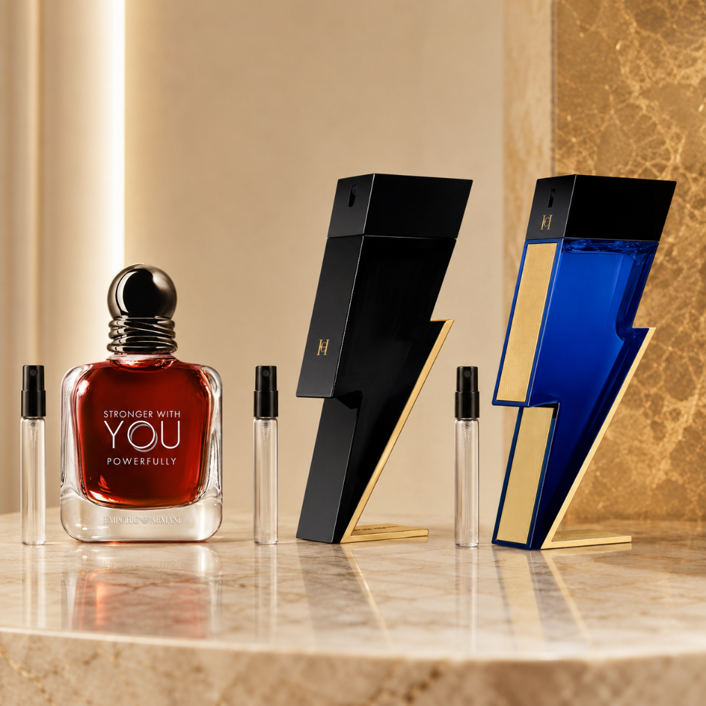 Dark Attraction Set z perfumami Carolina Herrera Bad Boy, Carolina Herrera Bad Boy Cobalt Absolute i Armani Stronger With You Powerfully oraz szklanymi atomizerami na odlewki perfum.