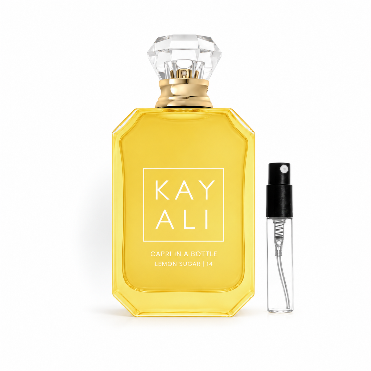 Kayali Capri in a Bottle Lemon Sugar | 14 – oryginalny flakon obok odlewki z atomizerem