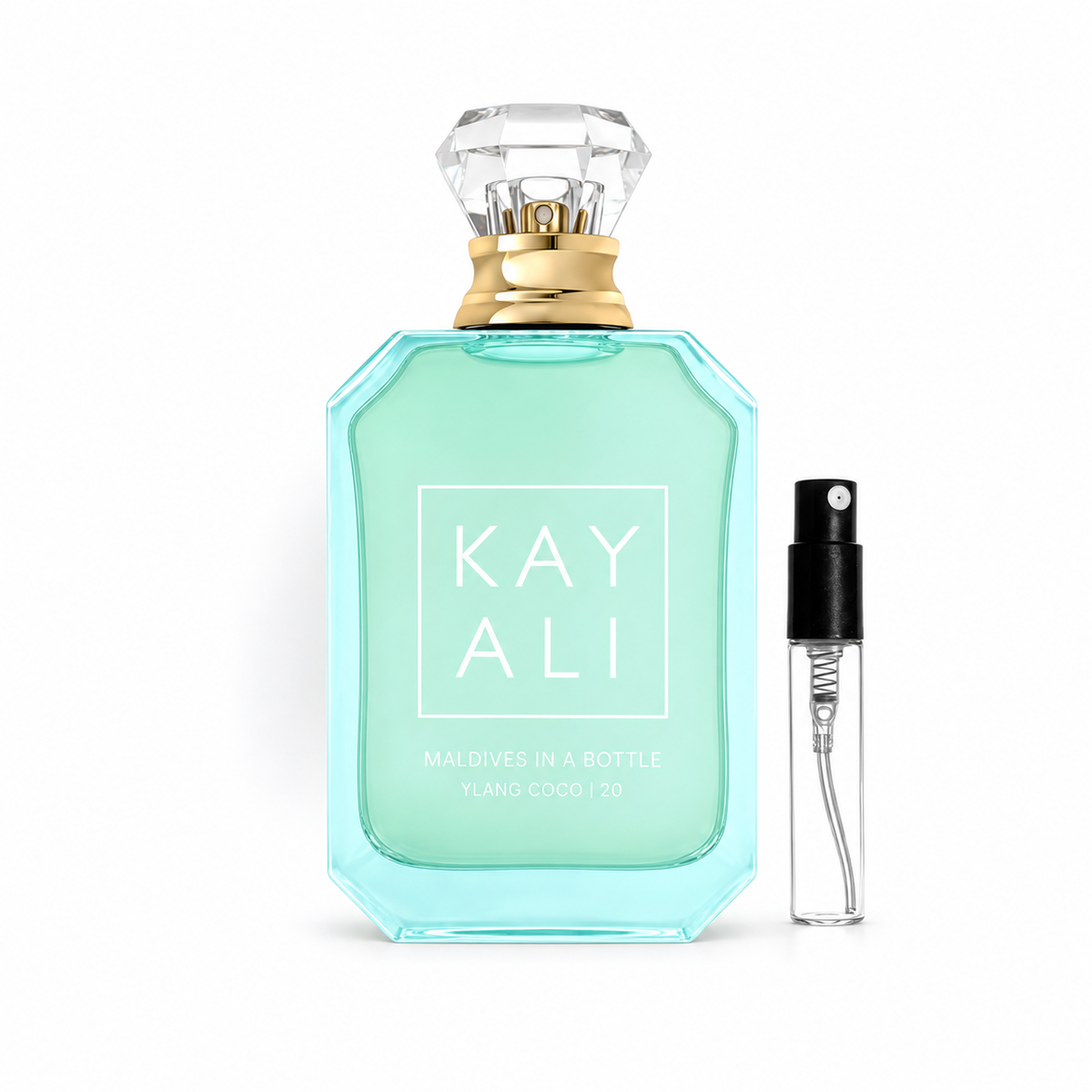 Kayali Maldives in a Bottle Ylang Coco | 20 – oryginalny flakon obok odlewki z atomizerem
